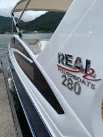 Lancha com motor de popa Real 280 Special Deck