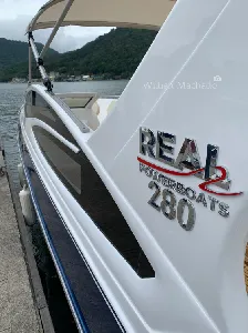Clique para visualizar Lancha com motor de popa Real 280 Special Deck
